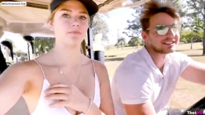 Golf Girl Rides On The Course